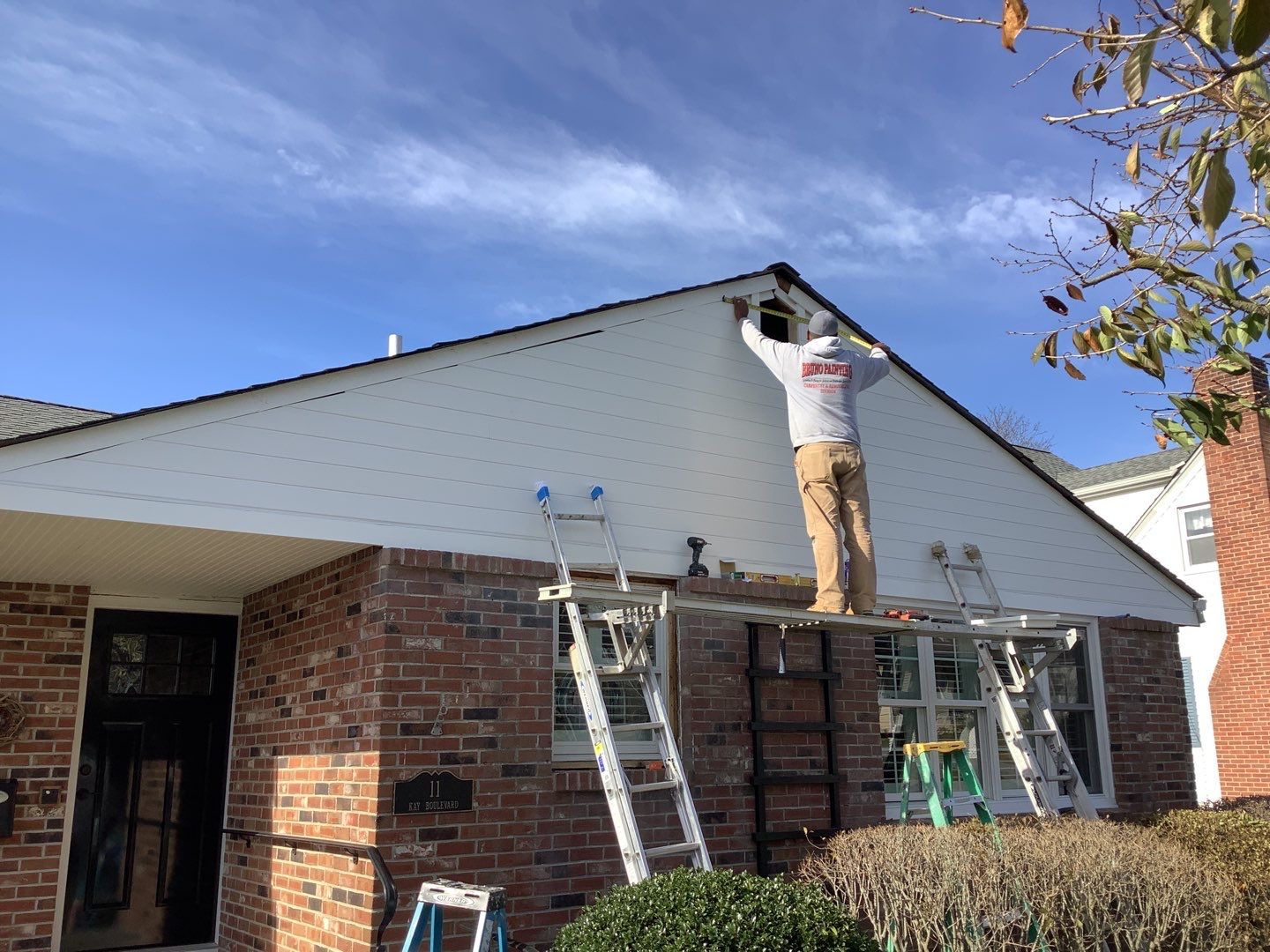 Bruno Painting fixes a roof