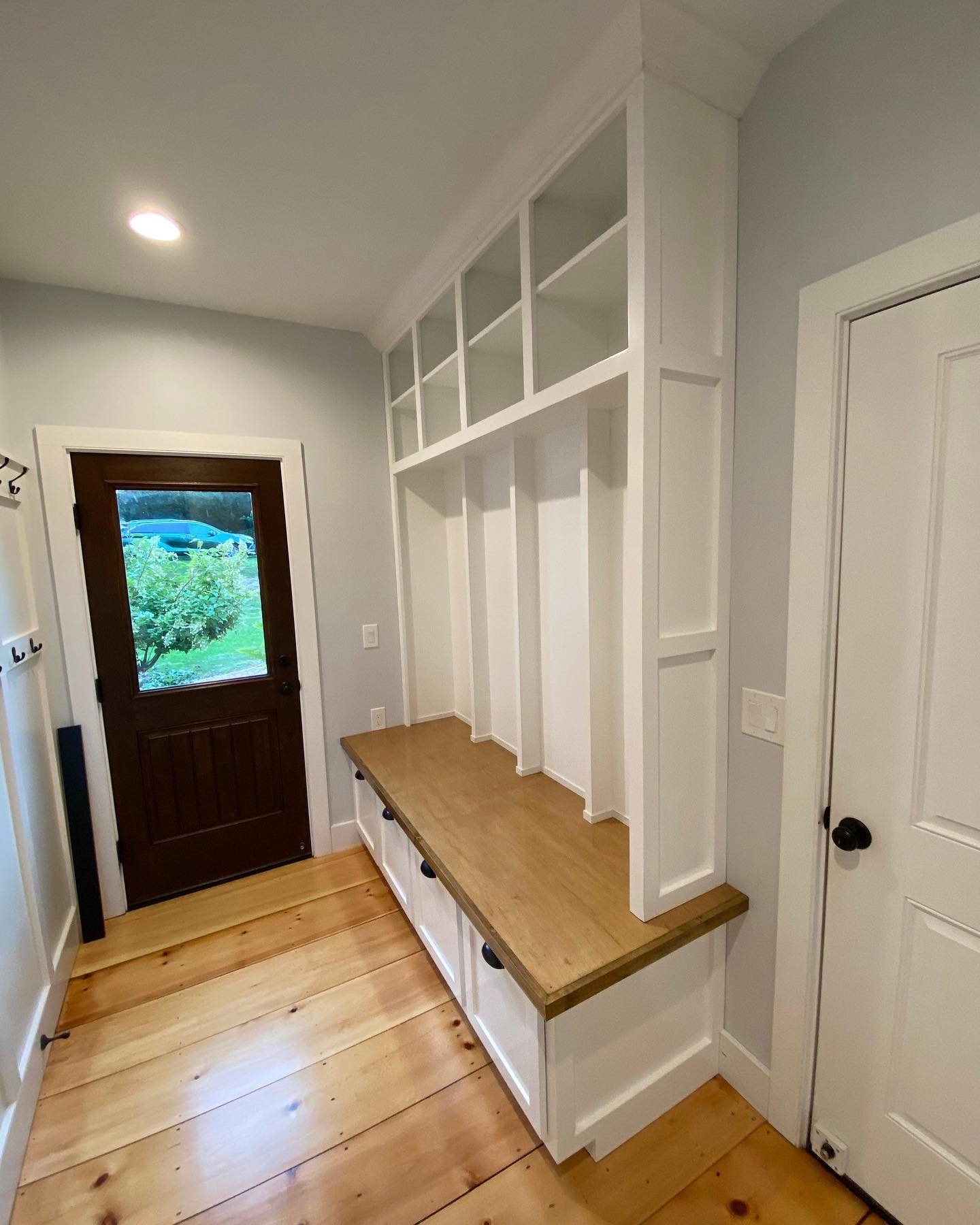 Adding a mudroom is a great carpentry project to elevate your home.